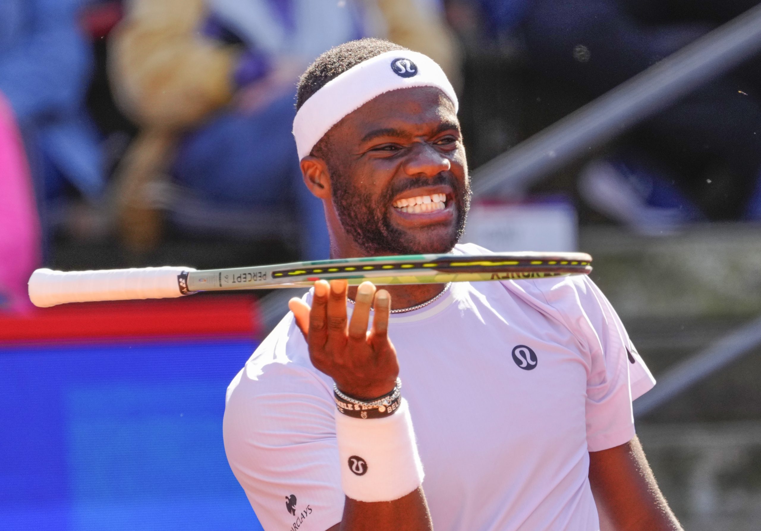 Tiafoe fights his way into the next round